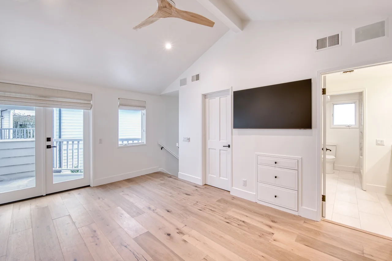 Upstairs bedroom with balcony access